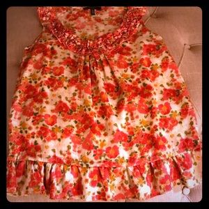 sleeveless flowered blouse